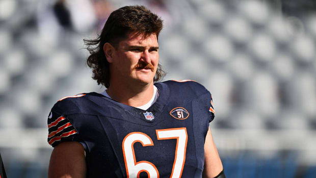 Oct 15, 2023; Chicago, Illinois, USA; Chicago Bears offensive lineman Dan Feeney (67) warms up before a game against the Minnesota Vikings at Soldier Field.